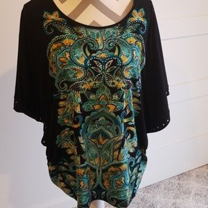 Floral teal and gold print on black